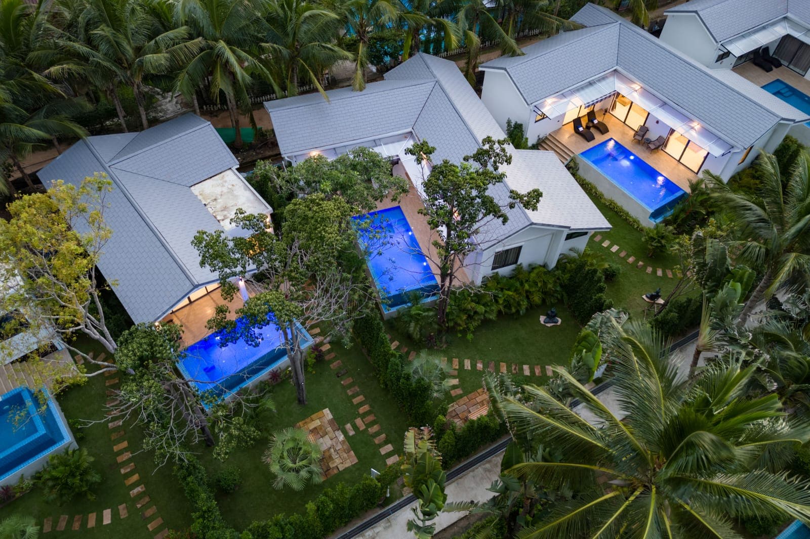 Villa 2 Bedrooms aerial view with pools and tropical palms